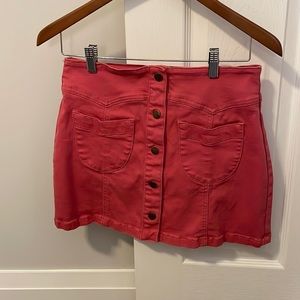 Forever 21 button up skirt. Pink. Used but nice condition.